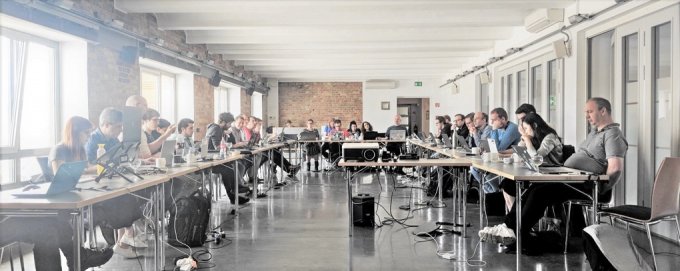 A room filled with members of the CSS working group.