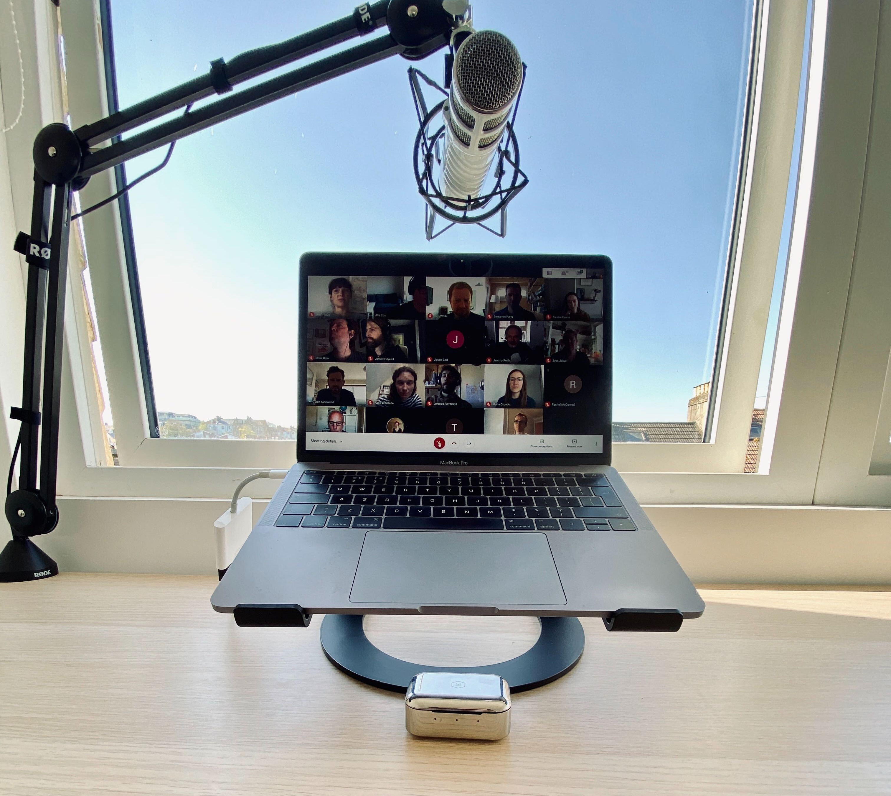 Laptop with a zoom call and microphone