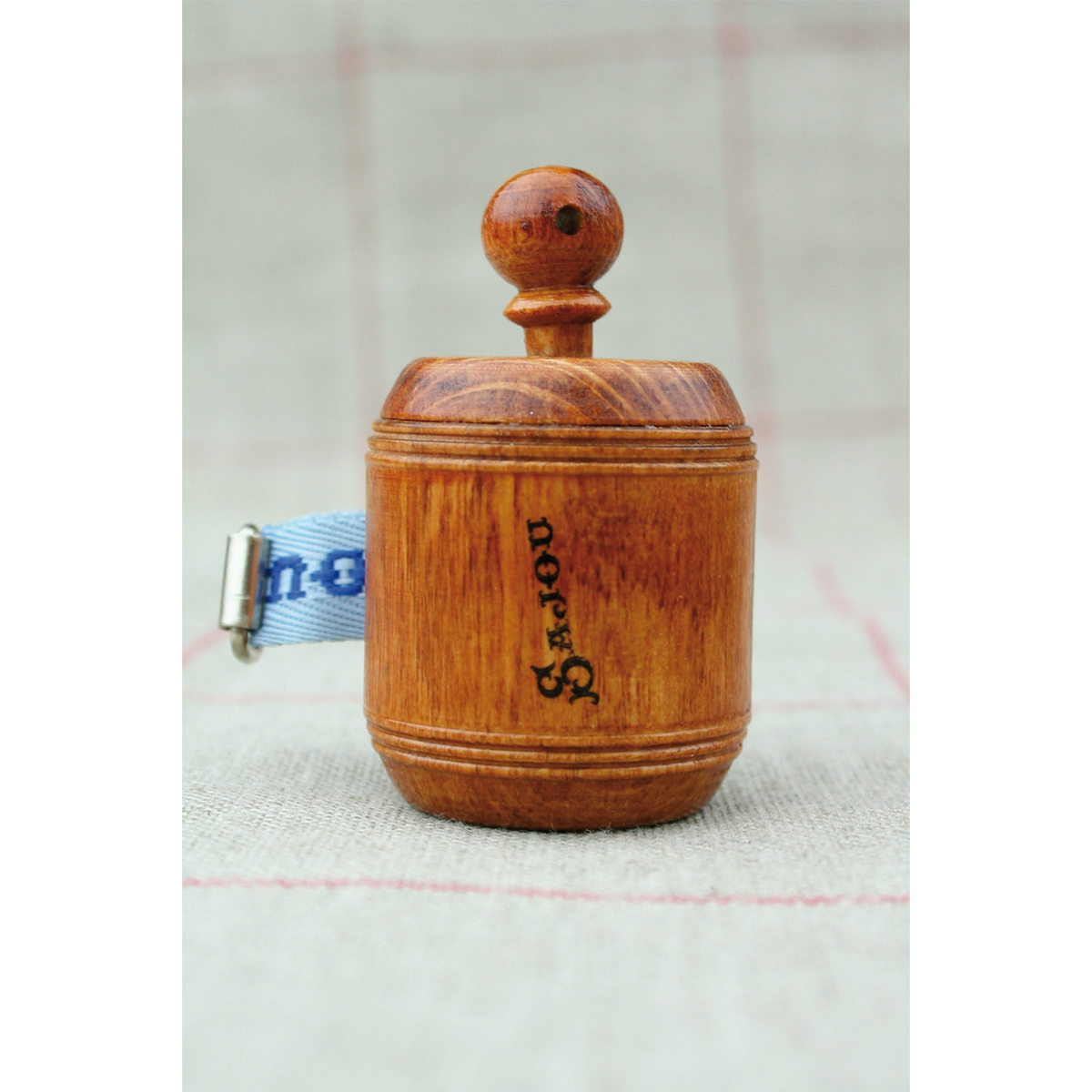 Blue wooden tape measure