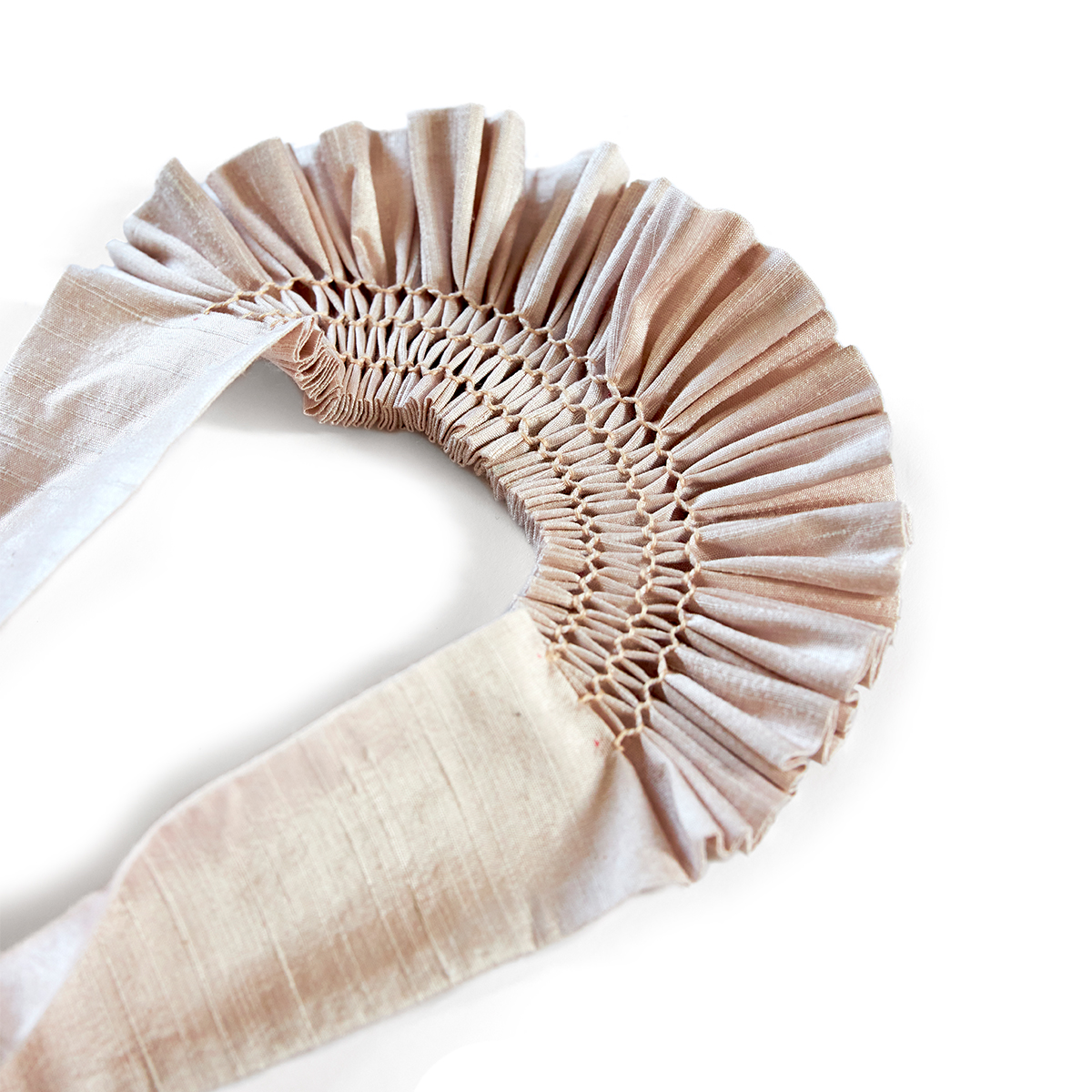Smocked putty silk headpiece by Cawley Studio Smocked putty silk headpiece by Cawley Studio