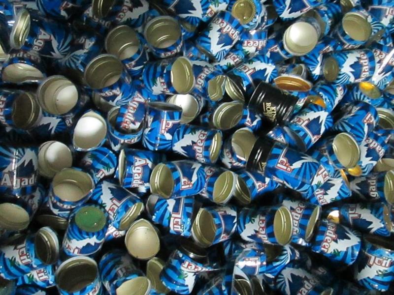 بالصور.. جمرك جسر الملك فهد يُحبط محاولتين لتهريب 87 زجاجة خمر