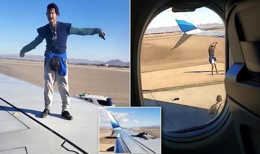 شخص يقتحم مطاراً بأمريكا ويصعد فوق جناح طائرة قبل إقلاعها 