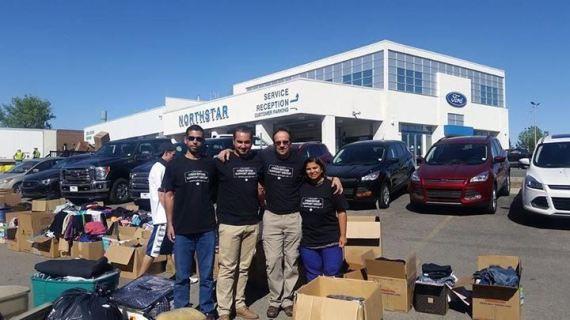 لاجئون سوريون يستقبلون كنديين 