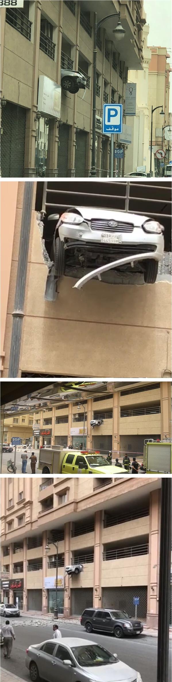 سيارة تتدلى من مواقف علوية في الخبر 