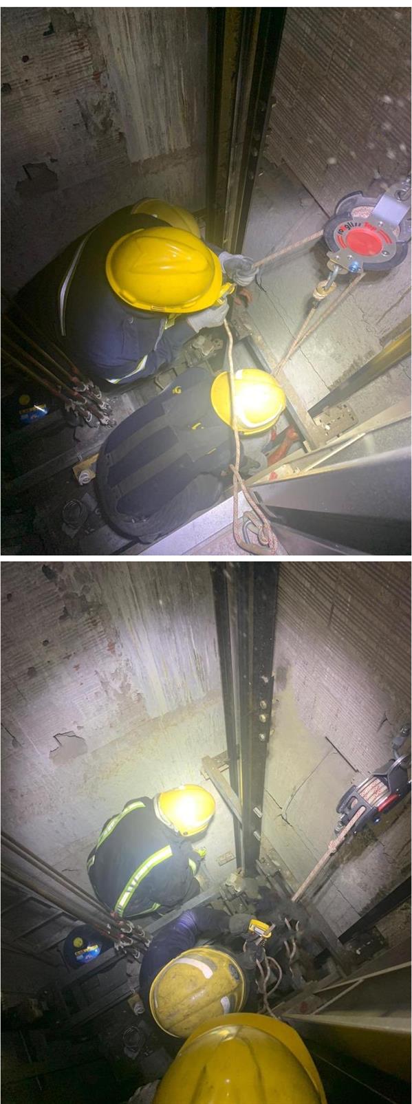 إنقاذ عامل احتجز بين كبينة مصعد وجدار