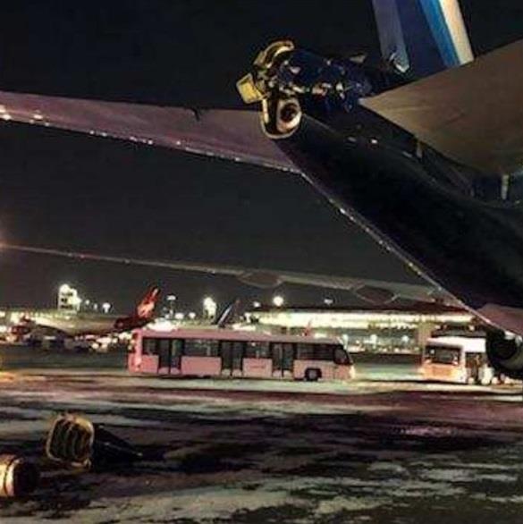 بالصور.. تصادم بين طائرة كويتية وأخرى صينية في مطار بنيويورك دون إصابات