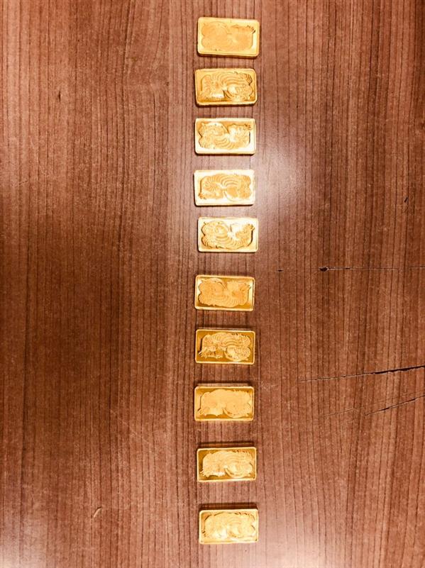 ضبط محاولة تهريب 10 سبائك ذهبية بمطار القاهرة 