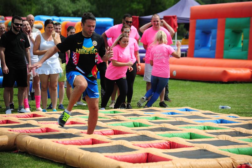 PMP raises over £25,000 for Unseen and Cancer Research UK at its family fun day