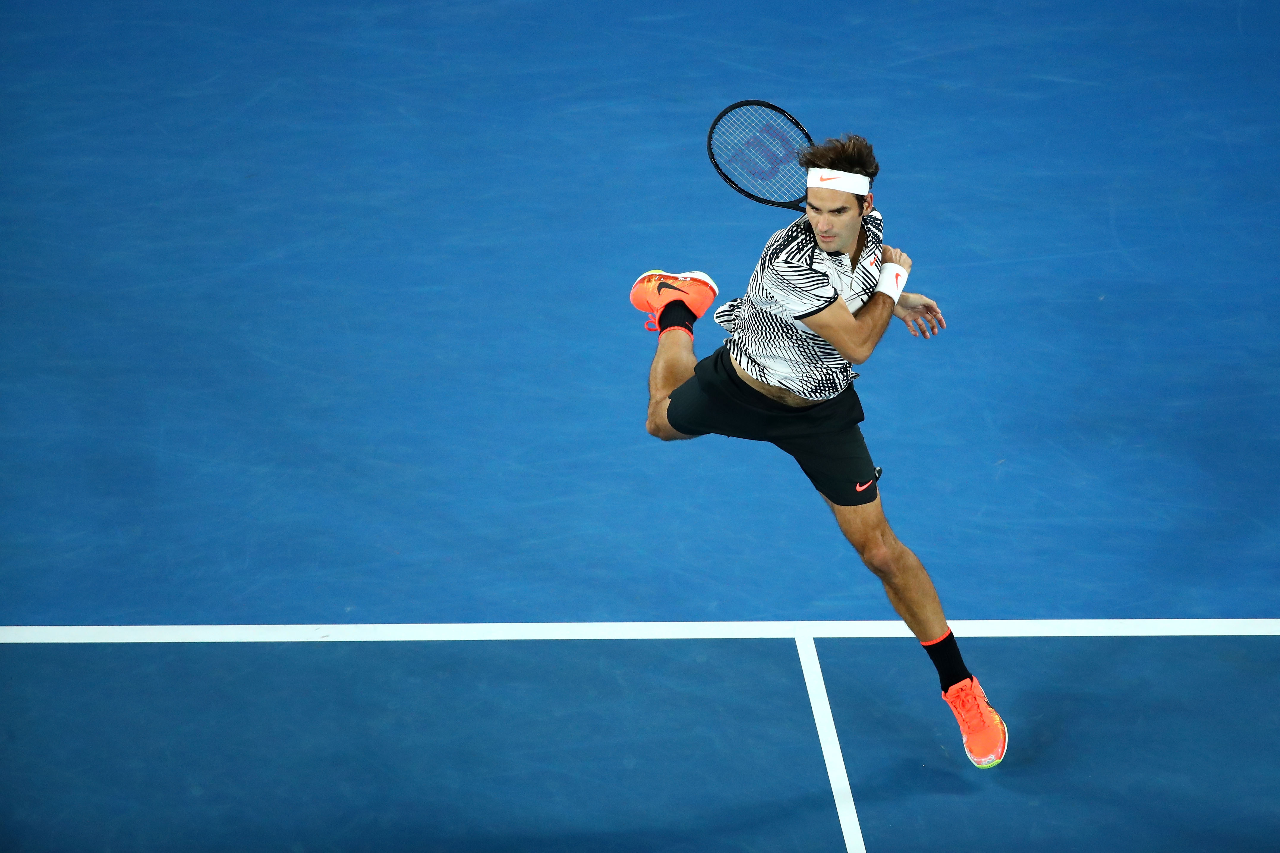Roger Federer in action against Stan Wawrinka at the Australian Open