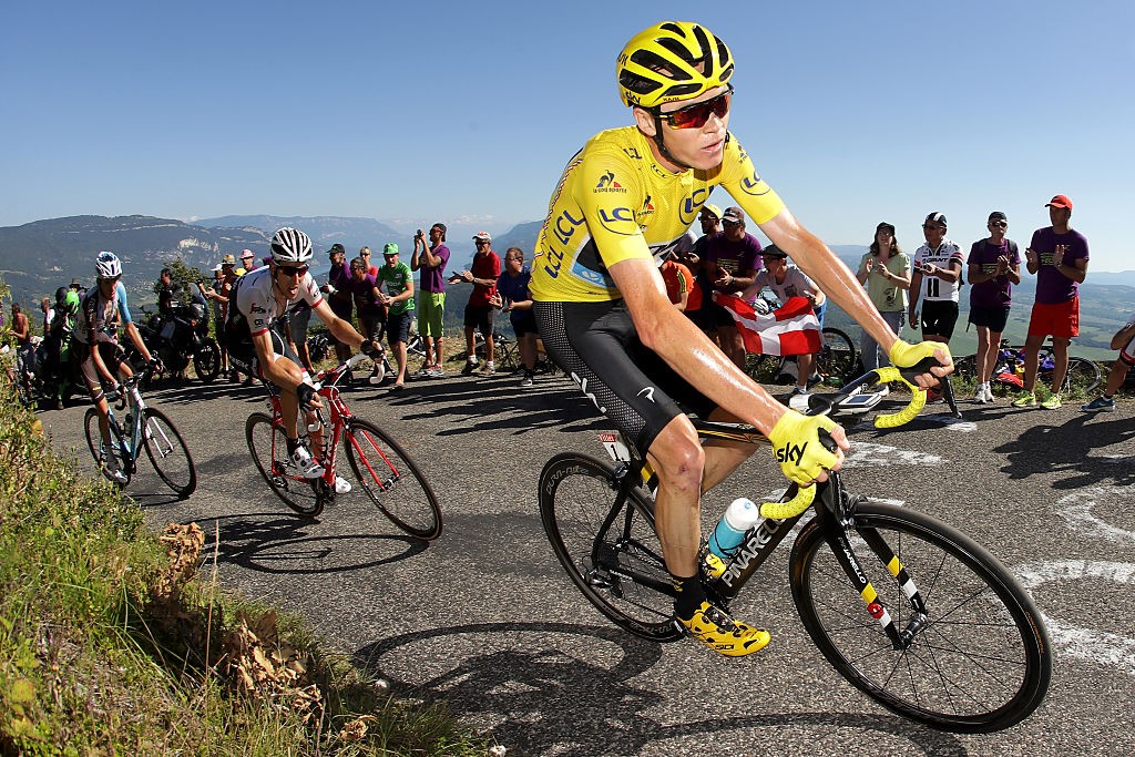 Chris Froome riding for Team Sky in the yellow leader's jersey during stage fifteen of the 2016 Tour de France