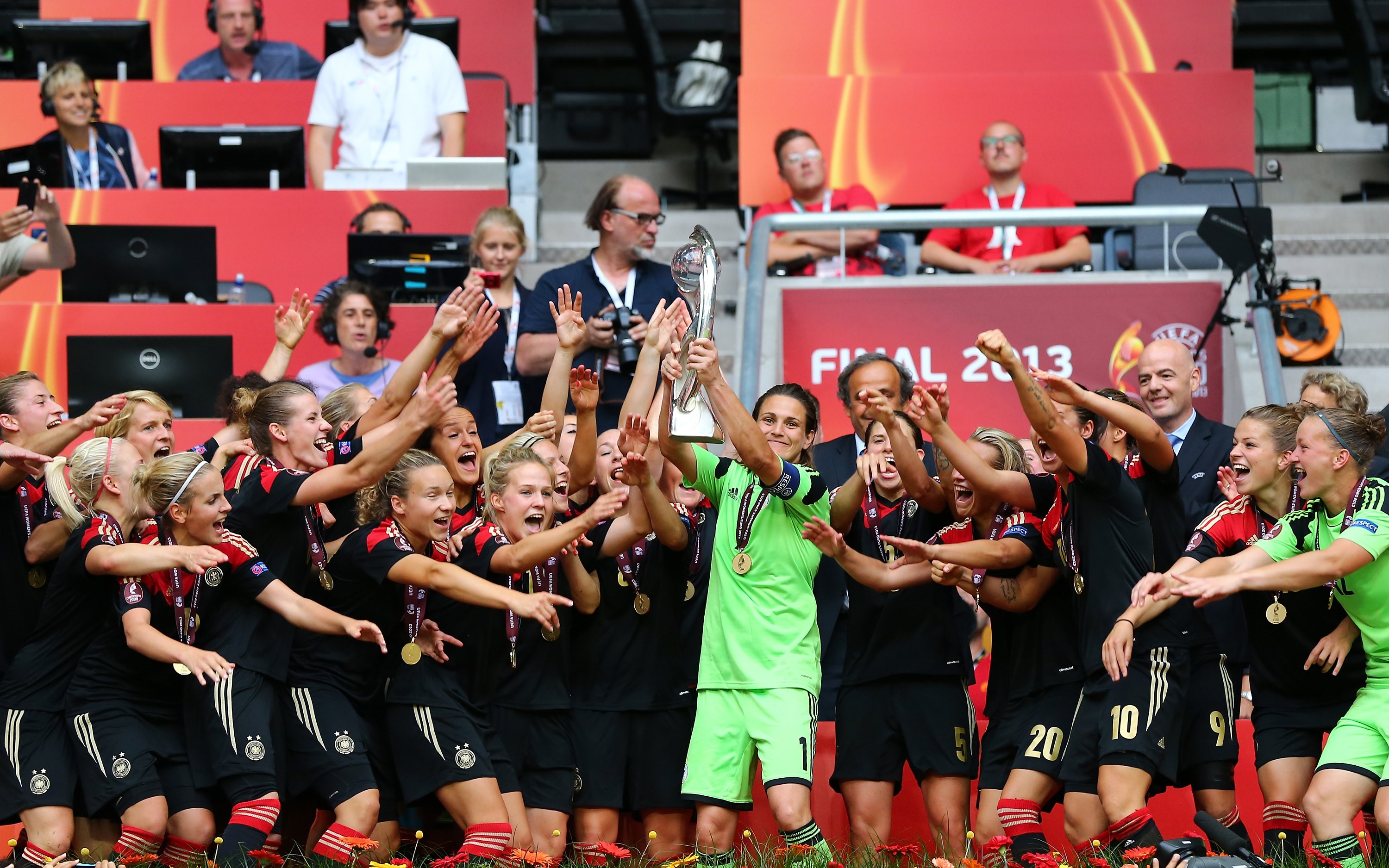 Captain Nadine Angerer lifts the European Championship trophy after Germany beat Norway in 2013 