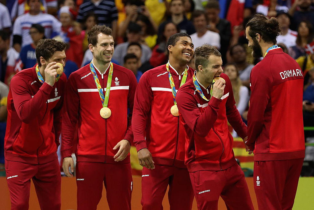 Image: Team Denmark celebrate winning gold in the men’s handball at the Rio 2016 Olympic Games (Image: Lars Baron/Getty Images)