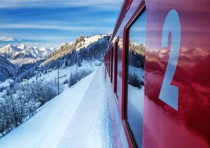 Ontdek de 4 grootste steden van Zwitserland tijdens een winterse fly & train