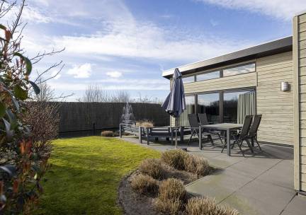 Watervilla op park Familiehuis Nunspeet aan een vijver