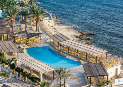4*-hotel direct aan het strand in St. Pauls Bay op Malta incl. vlucht