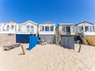 Slaapstrandhuisje bij Dishoek direct aan zee met panoramisch uitzicht en terras | 342