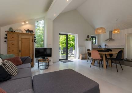 Vakantiehuis "De Tuureluur" in Dishoek | Privacy in een bosrijke omgeving op loopafstand van het strand | Vebenabos 69