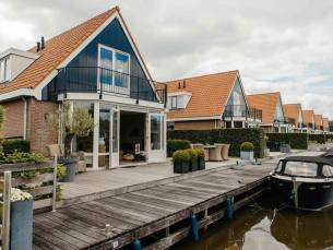 Vakantievilla met terras en zicht op haven 6-persoons