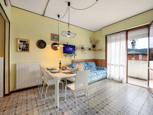 Edera with balcony few steps from sea