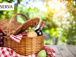 Goedgevulde picknickmand bij Reserva