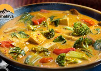 Currybowl- + frisdrank naar keuze voor afhaal bij Restaurant Himalaya