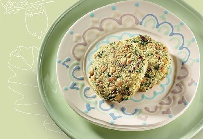 Burger di ceci, cous cous e spinaci