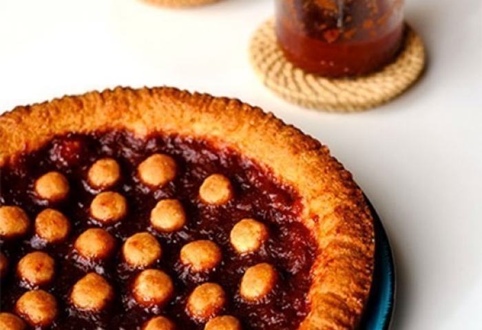 Crostata vegana con confettura di prugne