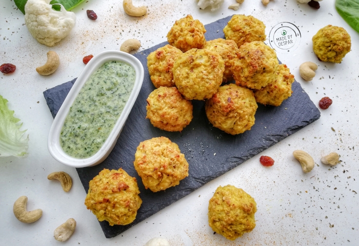 Polpette di cavolfiore con curcuma, uvetta e anacardi