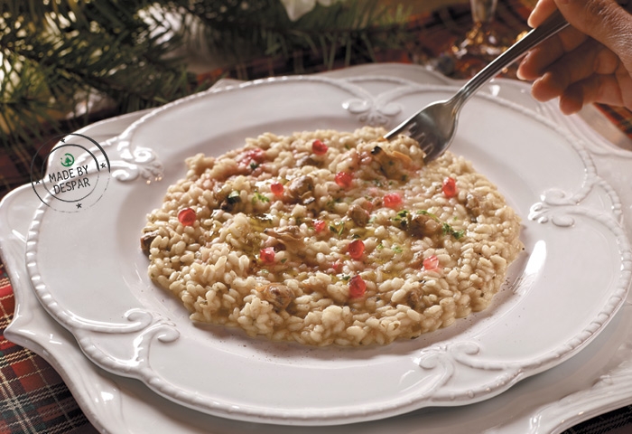 Risotto alle vongole e melagrana