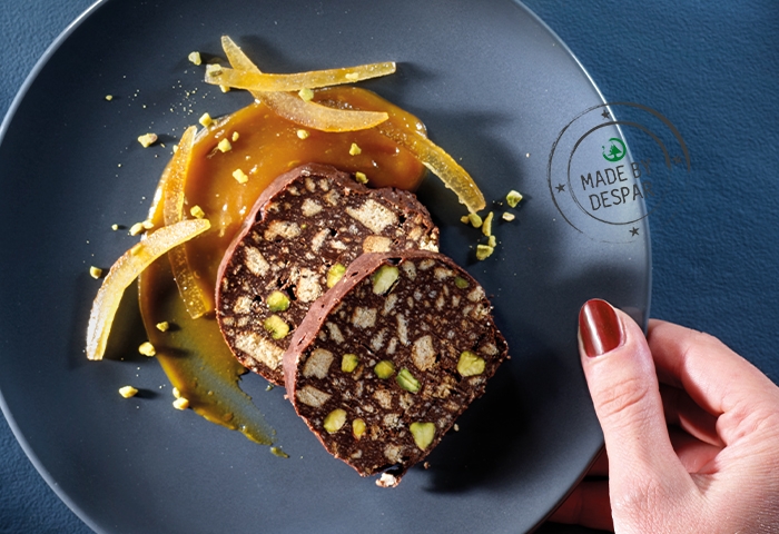 Rotolo al cioccolato, pistacchio, arancia e zenzero