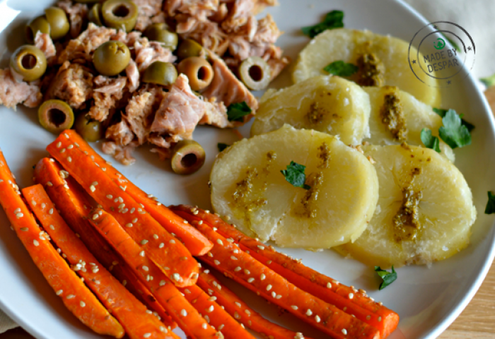 Tonno all’olio extra vergine di oliva con olive, carote brasate al sesamo e patate al pesto