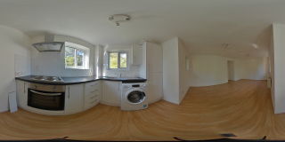 RECEPTION ROOM AND KITCHEN AREA