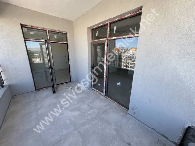 SİVAS GMT EMLAK MUHSİNYAZICIOĞLU BULVAR SATILIK 2+1 ARAKAT DAİRE