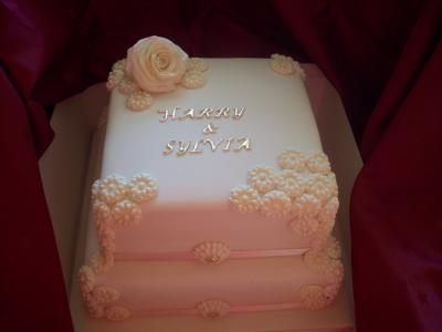 Designer Rose Flowers Ivory Wedding Cake
