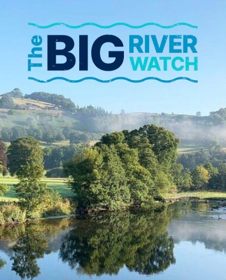 Image of a river with trees lining the bank and a blue sky. Text reads 'The Big River Watch' at the top of the image.
