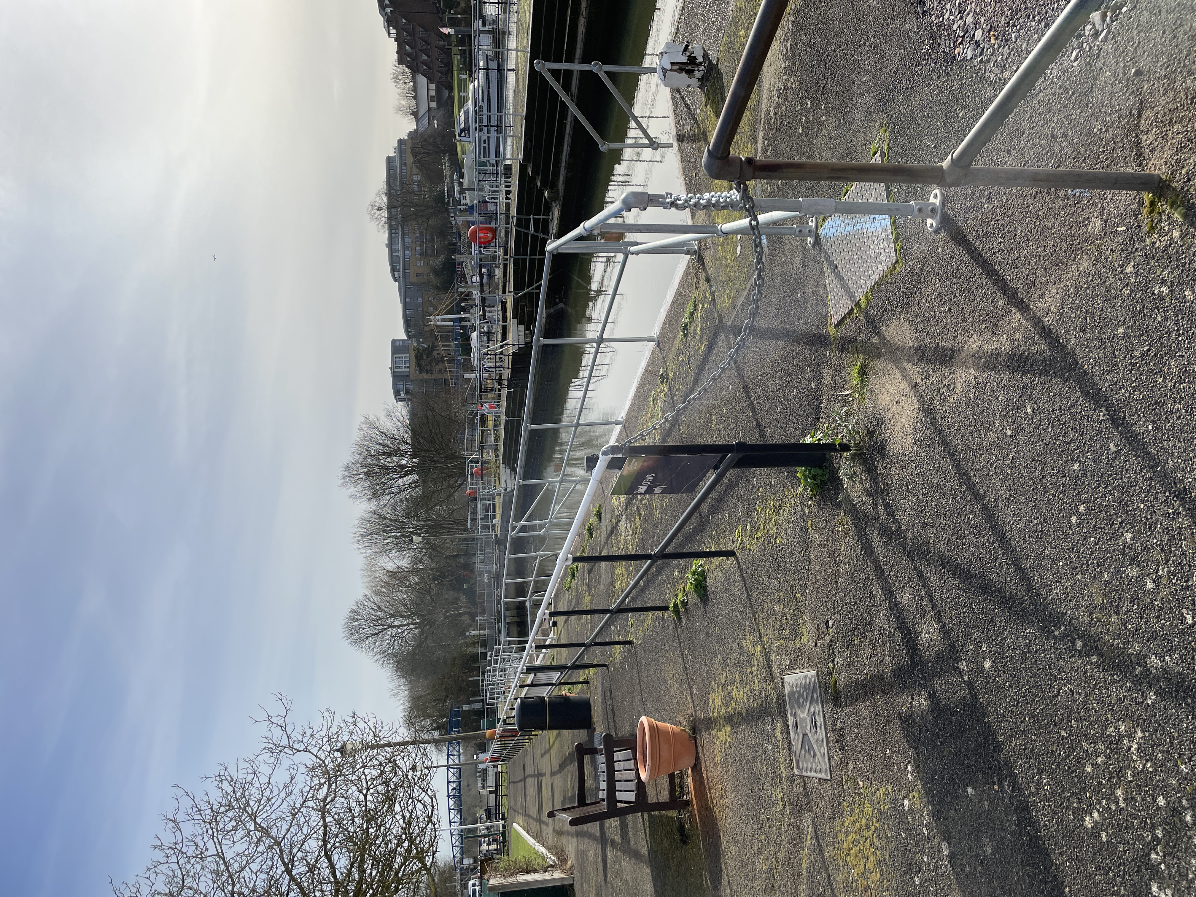 view of Teddington Launch Lock looking upstream with the footbridge in the background