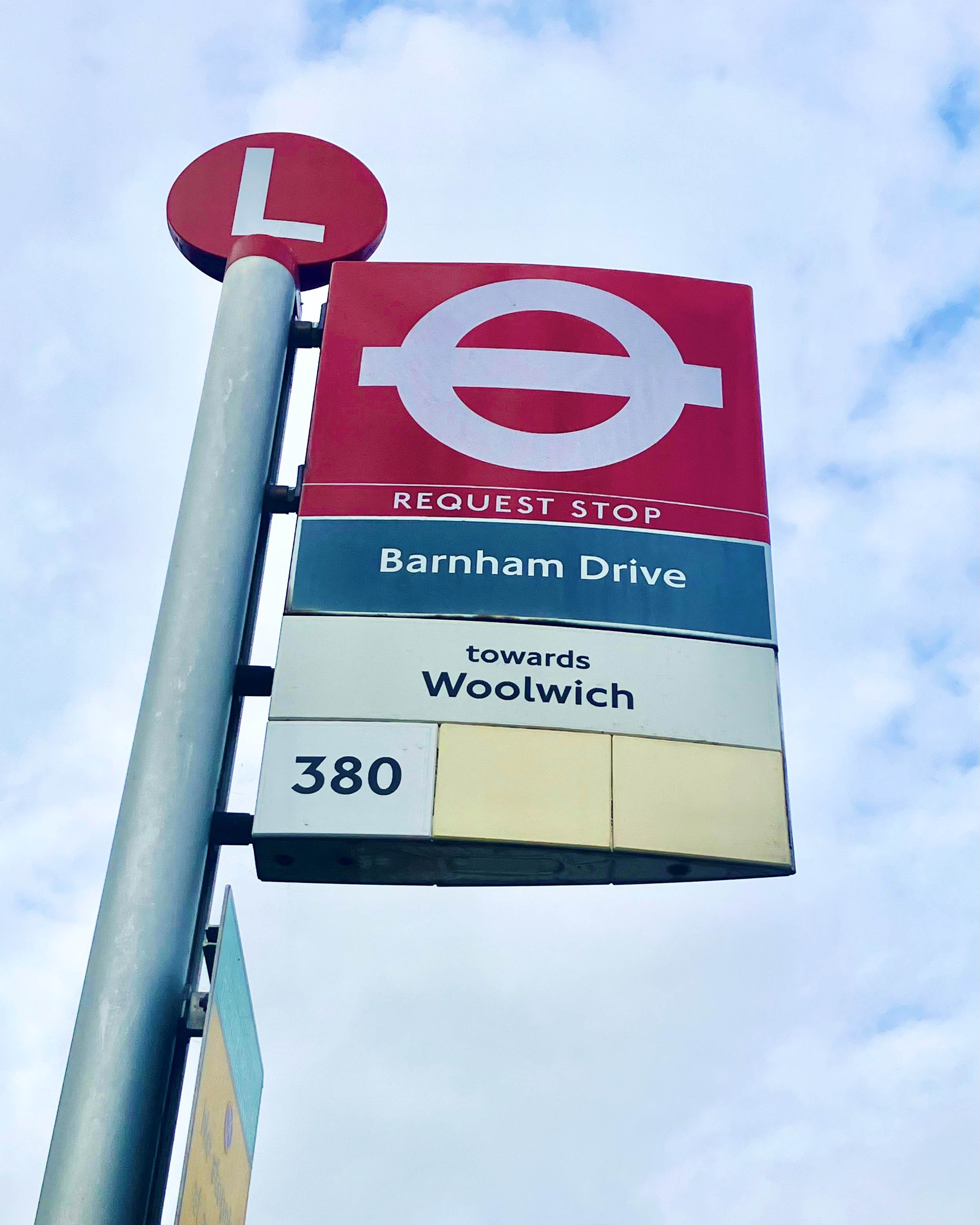 Photo of a bus stop flag at Barnham Drive