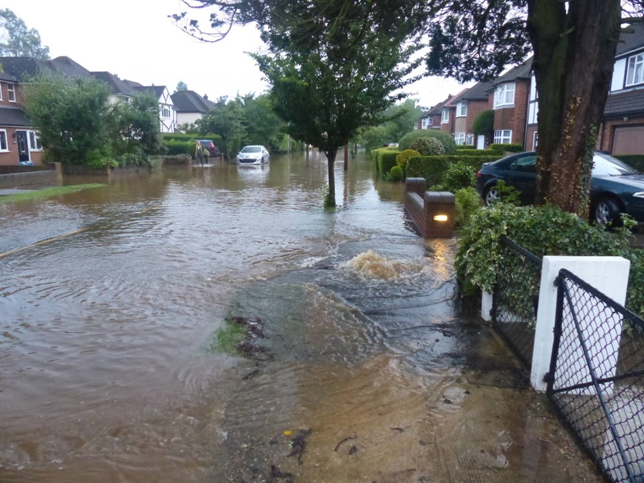 Floodwater covering Broadwood Avenue and surrounding residential properties during the 23 June 2016 flood event in Hillingdon.