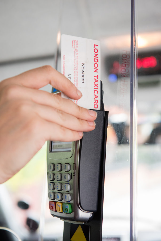 Image of Taxicard being used in a black cab