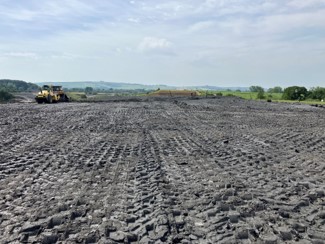 Clay layer on top of landfill cell