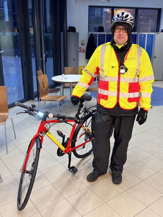 Image of a Council Civil Enforcement Officer standing next to bike