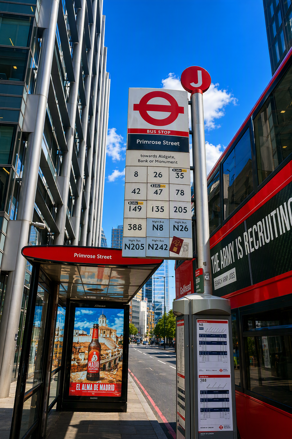 Primrose Street bus stop with route information, bus shelter and red double decker bus in the City of London