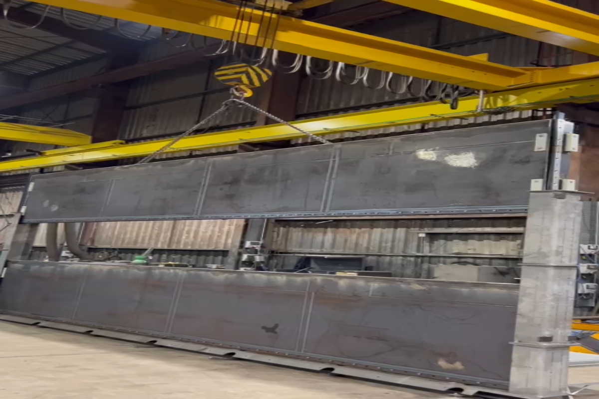 Phase One: Grand Sluice. Stop logs being factory tested.