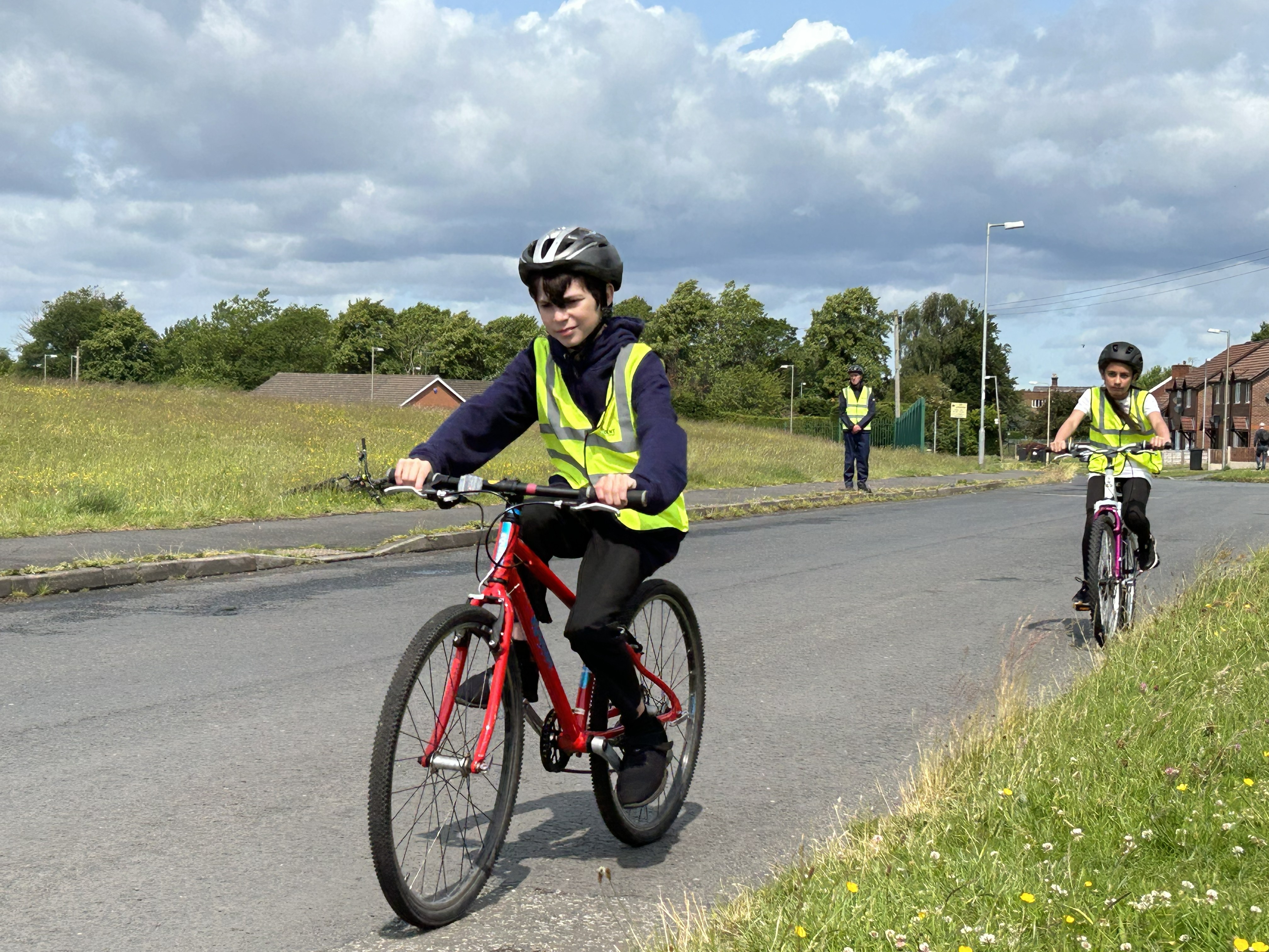 Children taking part in bikeability training