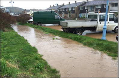 Flooded channel in Portreath following heavy rain