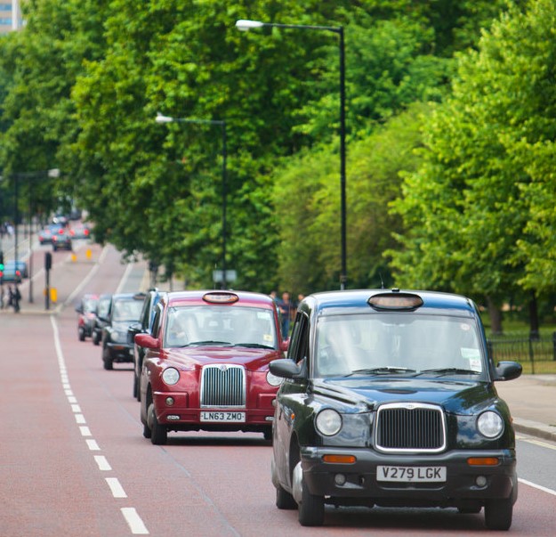 Image of taxis (black cabs) in Park Lane
