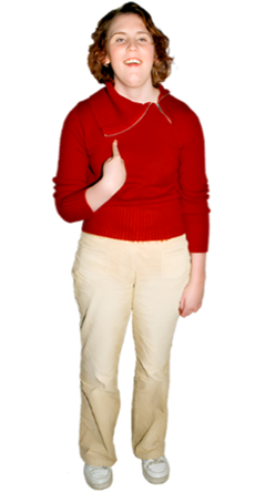 Person standing against a white background, wearing a red jumper, beige trousers, and white shoes. They have short hair and are pointing to their chest with one hand while the other arm hangs by their side.