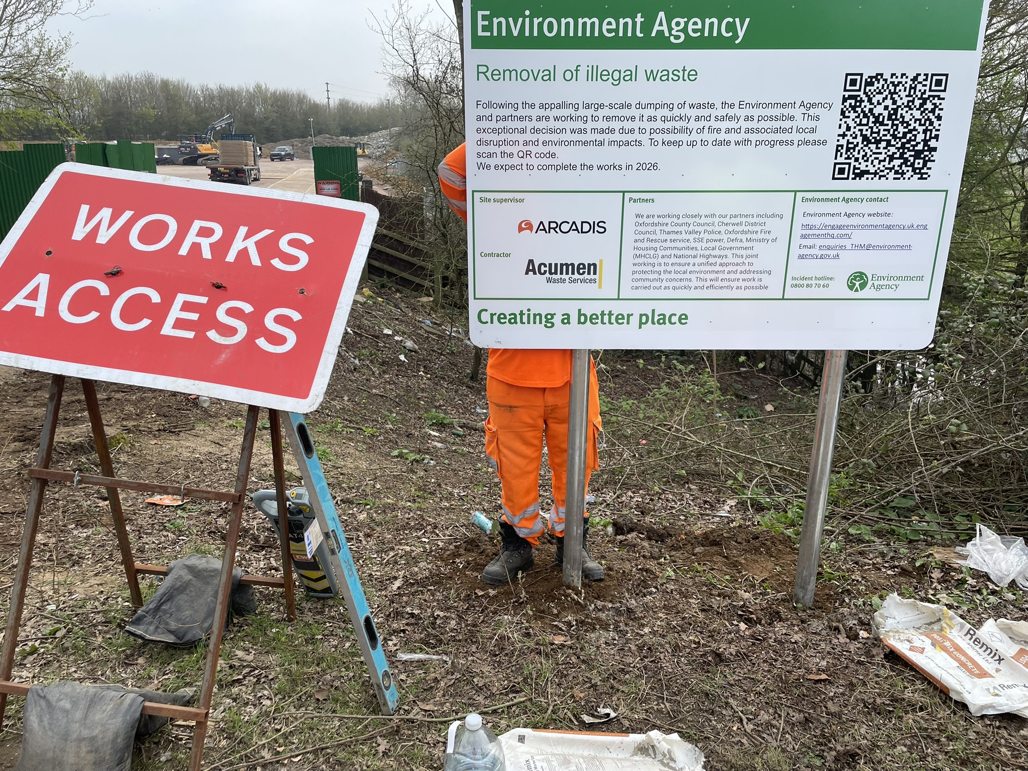 image showing the site sign being erected