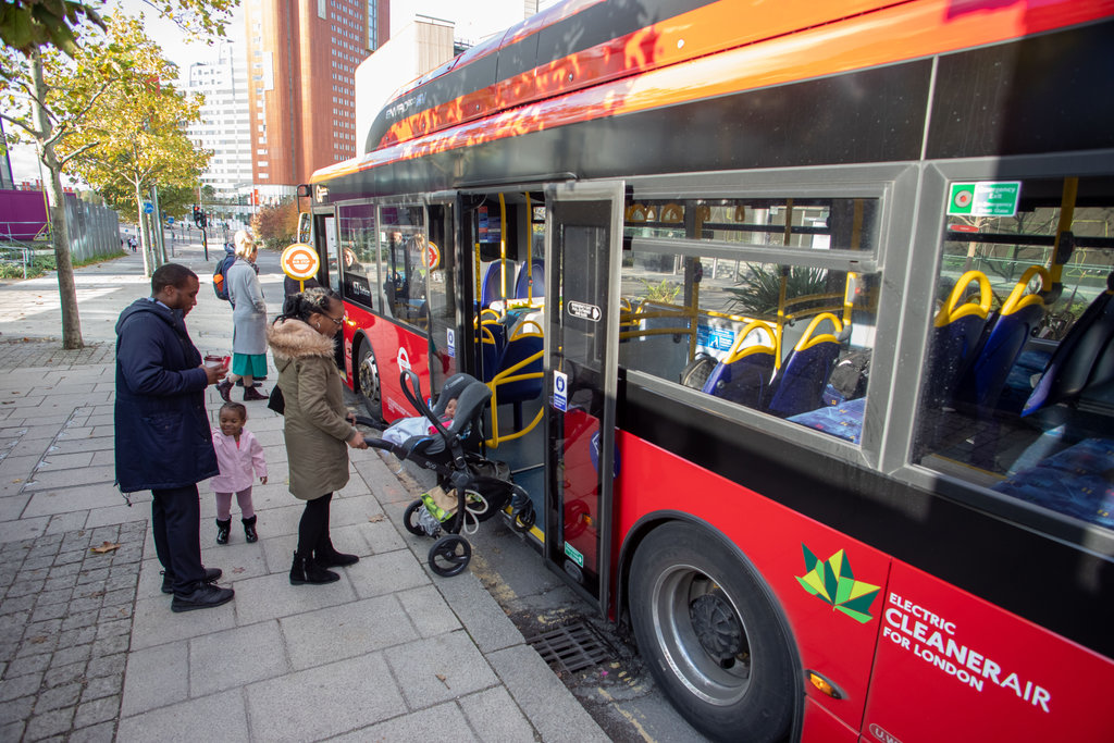 Image of family boarding a bus