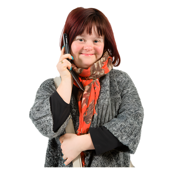 A young woman on her mobile phone smiling.